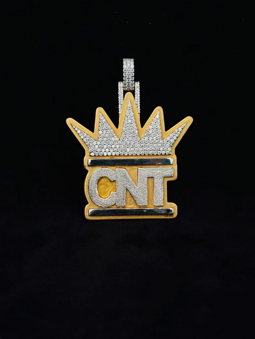 front view Hip hop style custom iced out crown pendant with CNT initials in yellow gold and diamonds.