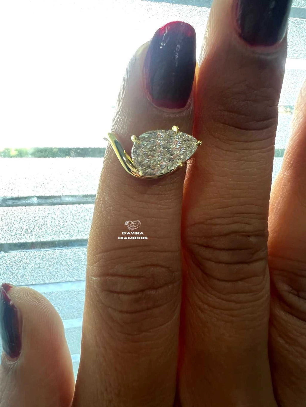 Pear Diamond Curved Solitaire Engagement Ring
