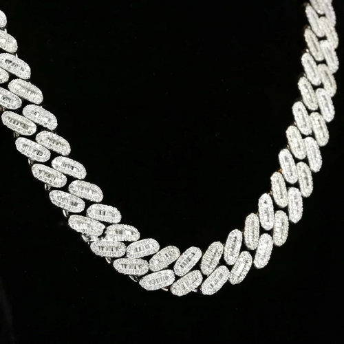 close up of a diamond Cuban link chain over a black background