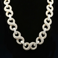 front view of the Gold and diamond infinity link chain necklace 