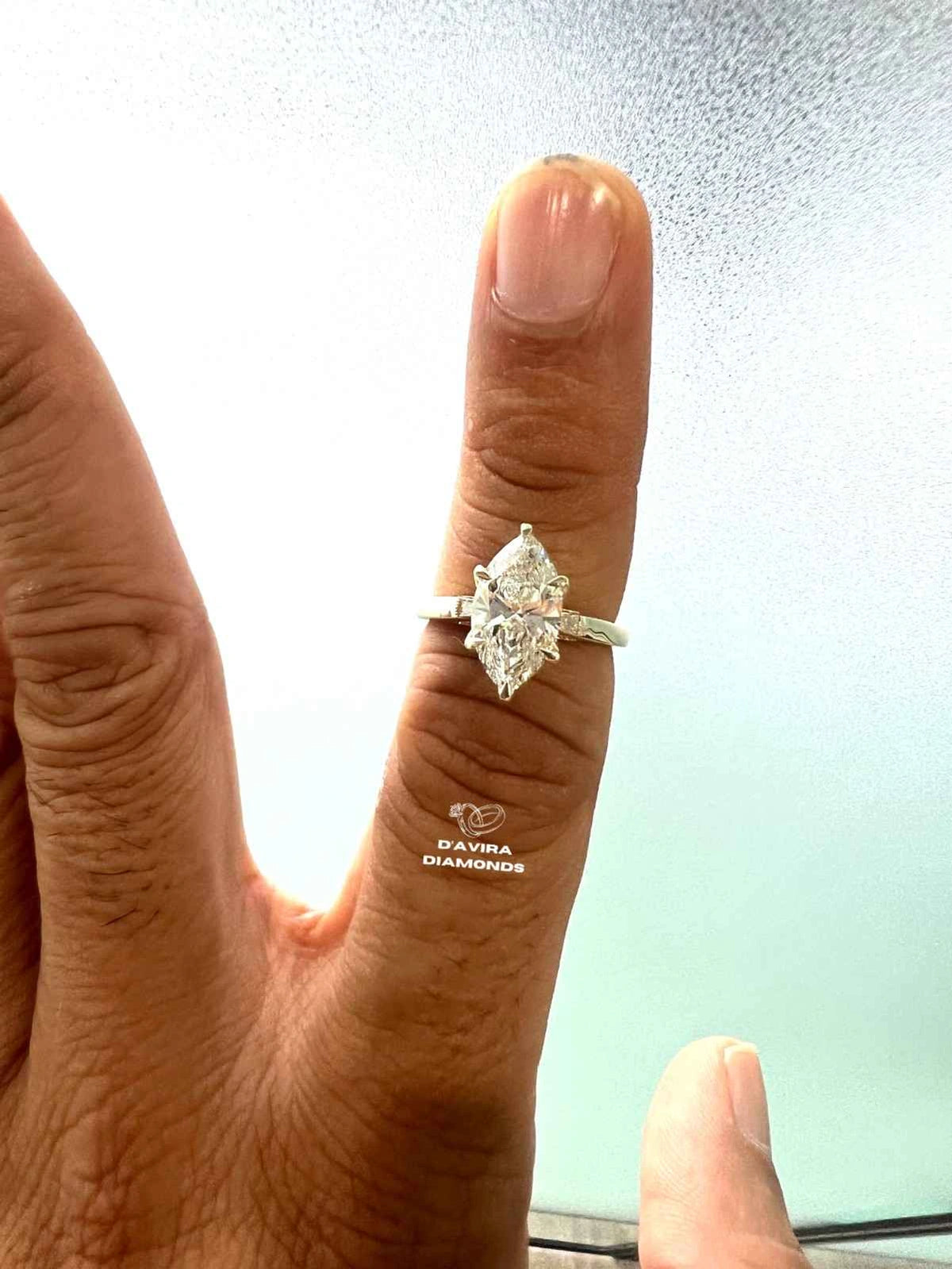 front view of the marquise cut lab grown diamond ring 