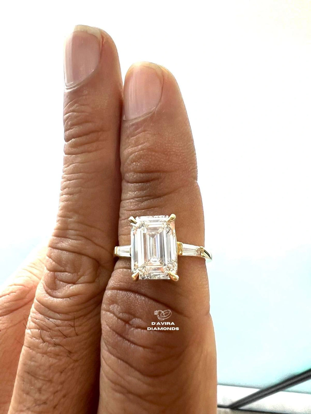 Close-up view of the emerald cut lab grown diamond ring