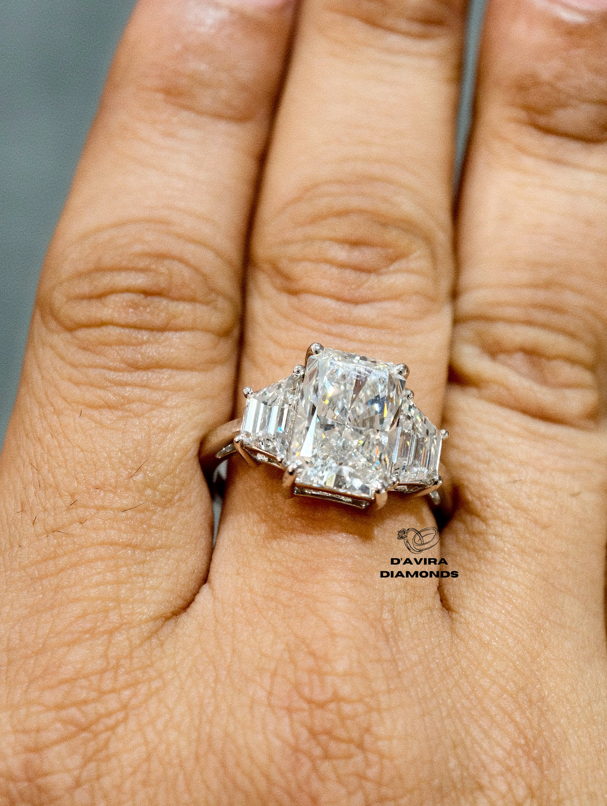 side view of the three stone unique style lab diamond ring
