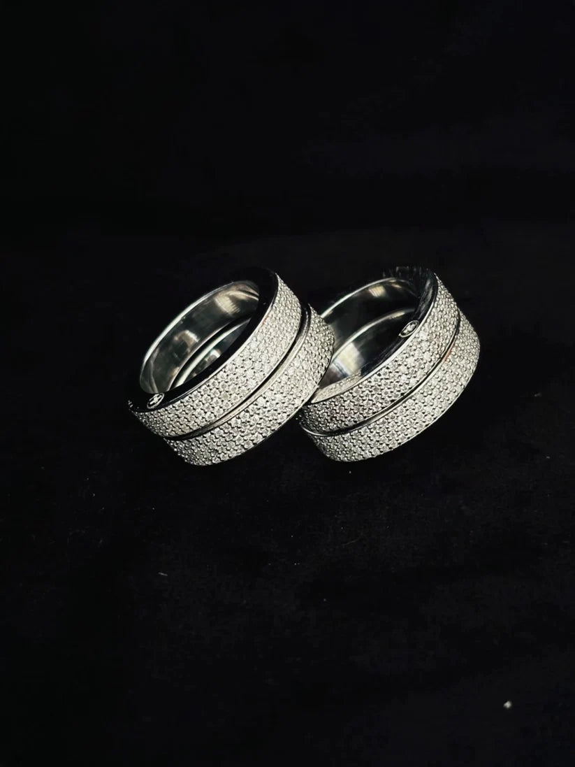 Silver multi-finger ring set with textured glitter finish pave diamond bands.