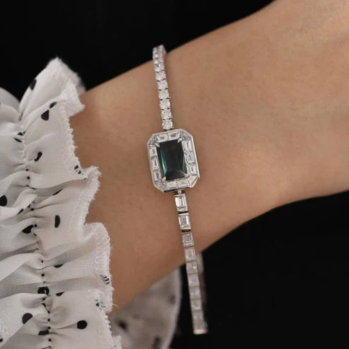 7.75 TWC Emerald Cut Green Stone Lab Grown Diamond Halo Bracelet in White Gold Baguette Diamond Tennis Bracelet
