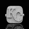 front view of the Large square pave diamond pinky ring featuring interlocking KC initials