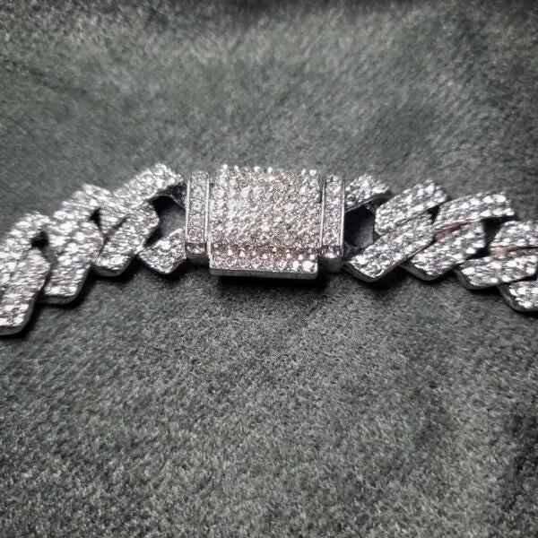 Diamond iced out Cuban link chain jewelry close up