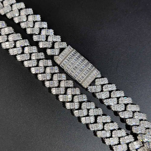 Close-up of a silver baguette diamond Miami Cuban link chain necklace with a iced-out pave box clasp