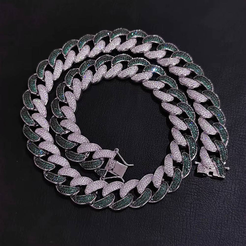 Iced out silver Cuban link chain with green and white pave