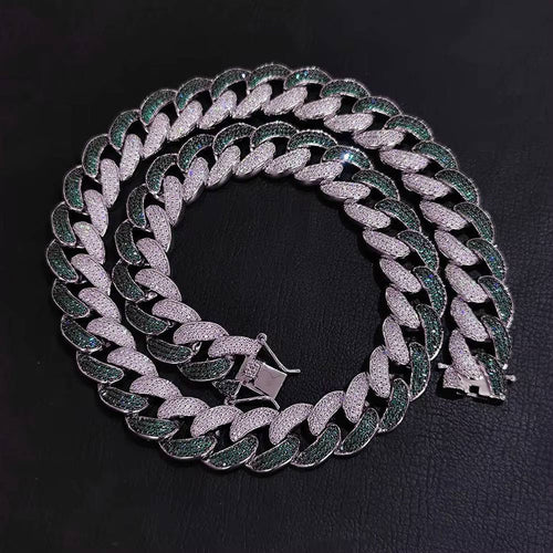 Iced out silver Cuban link chain with green and white pave