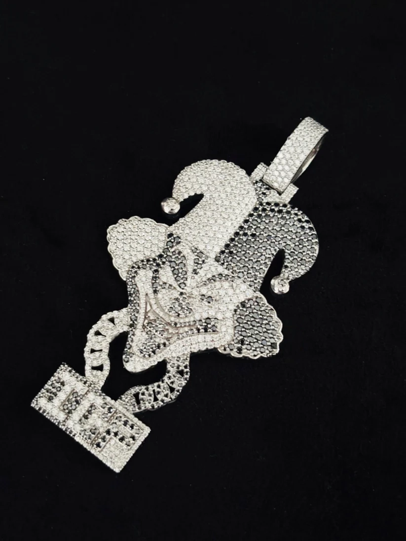 A silver jester pendant fully paved with Moissanite diamond stones