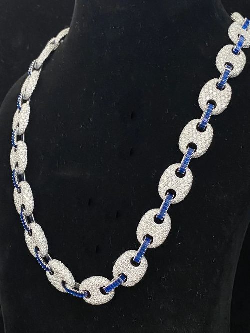 side view of the Iced out mariner link chain necklace with diamonds and blue sapphires