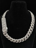 Iced-out silver Cuban link necklace with custom CAPONE diamond name lock