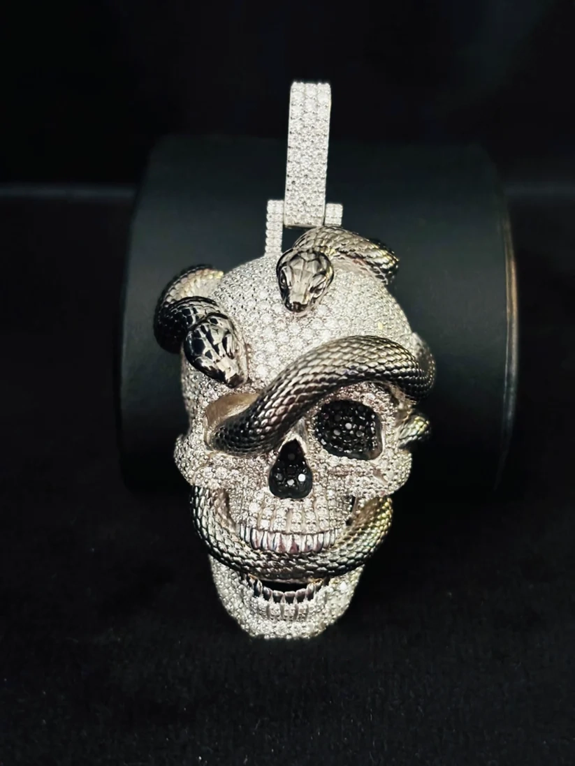 front view Moissanite diamond skull and snake pendant in 925 silver, hip hop iced out jewelry charm. 