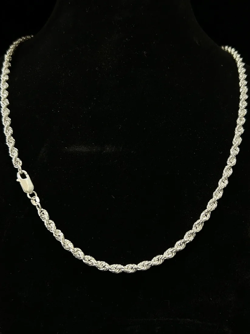 Silver diamond-cut rope chain necklace with lobster clasp closure