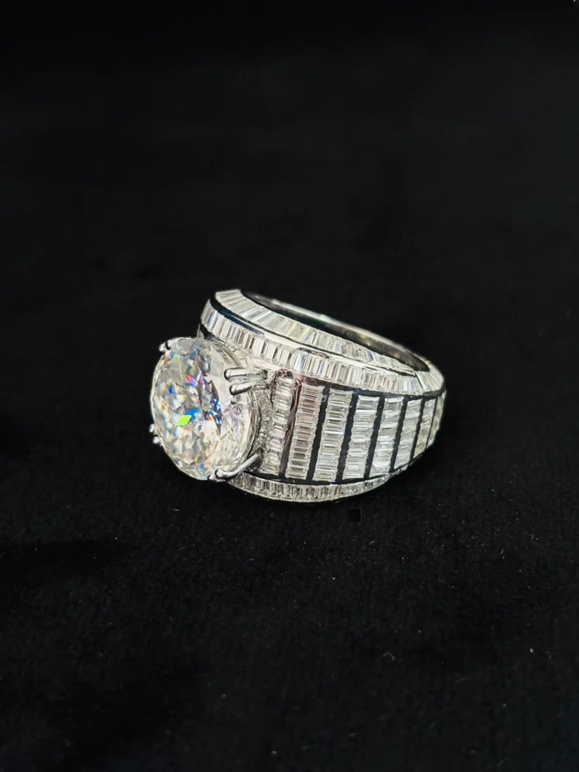 Side view of a vintage-style high-prong diamond engagement ring showcasing intricate under-rail diamond detailing