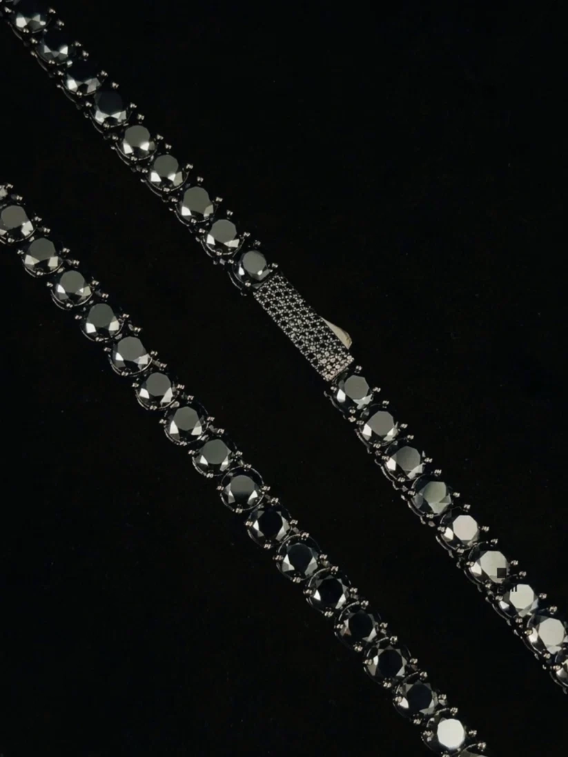 Black diamond tennis chain necklace with a paved box clasp 