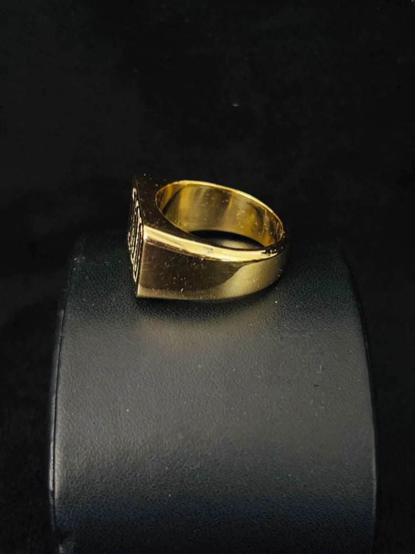 A side view Chunky gold plated signet ring for men with flat square face