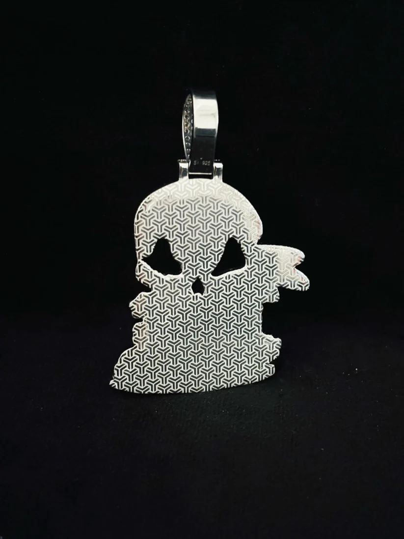 Back side of a custom 925 sterling silver hip hop pendant featuring an intricate geometric lattice pattern and large bail