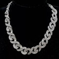 Silver baguette and round-cut diamond infinity link chain necklace displayed on a black bust