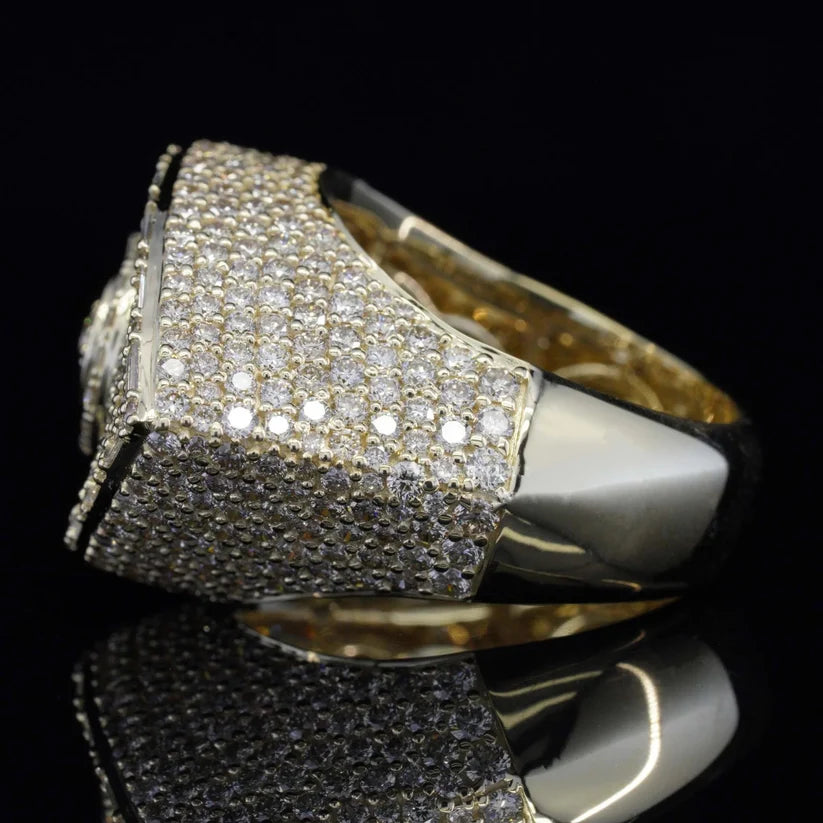 Men's yellow gold iced out pinky ring featuring multi-row pave diamond settings