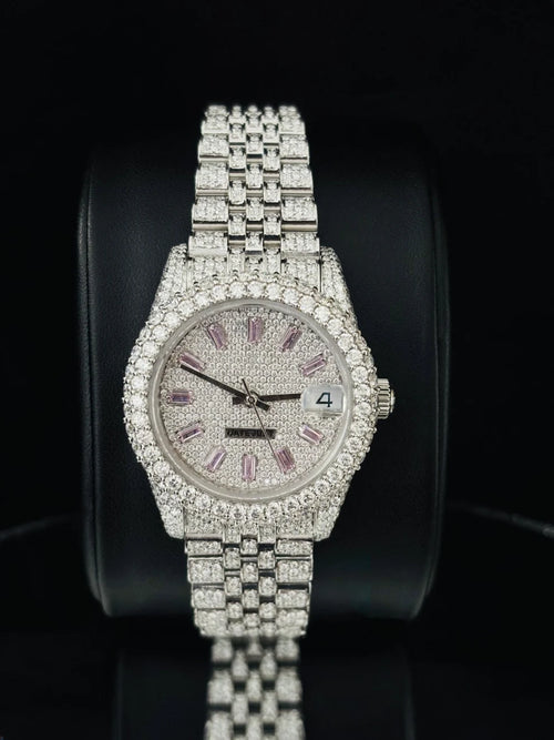 Close-up view Fully iced out silver luxury watch with diamond pave dial and jubilee band
