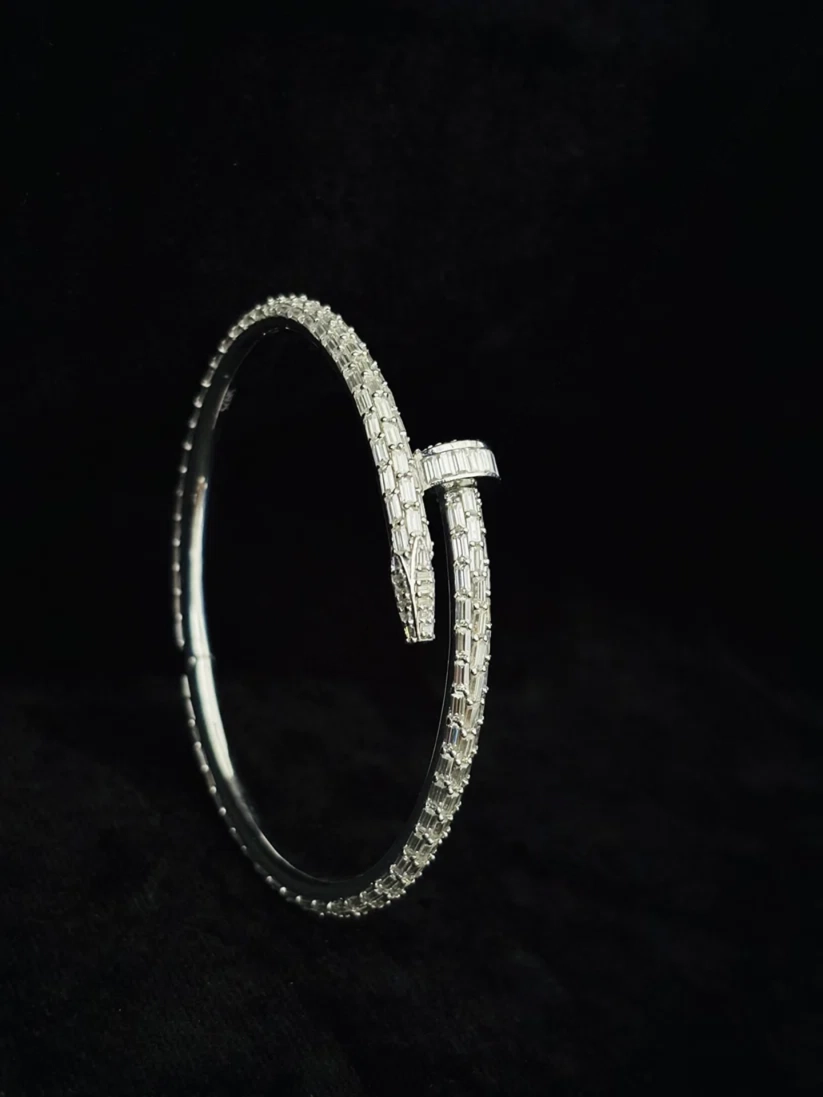 Side view Close-up of a luxury iced-out nail bracelet style jewelry trend