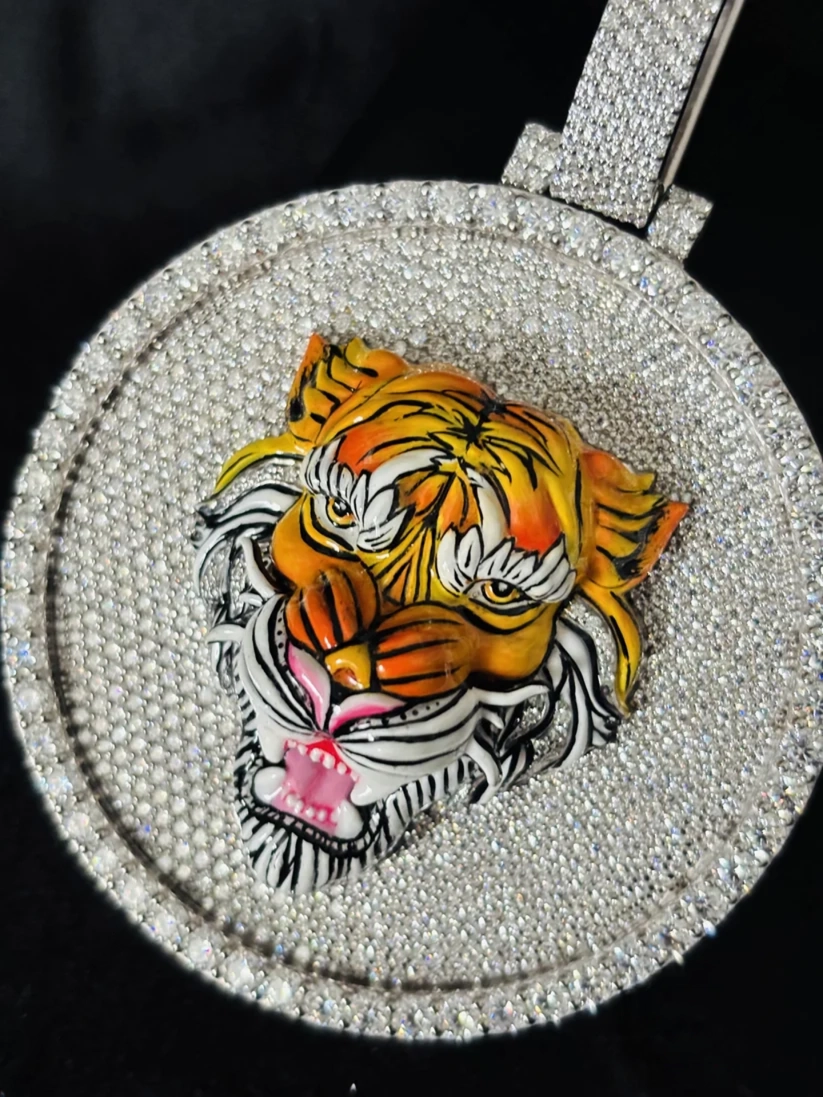 Custom 3D enamel tiger face pendant in iced out moissanite circular medallion charm.