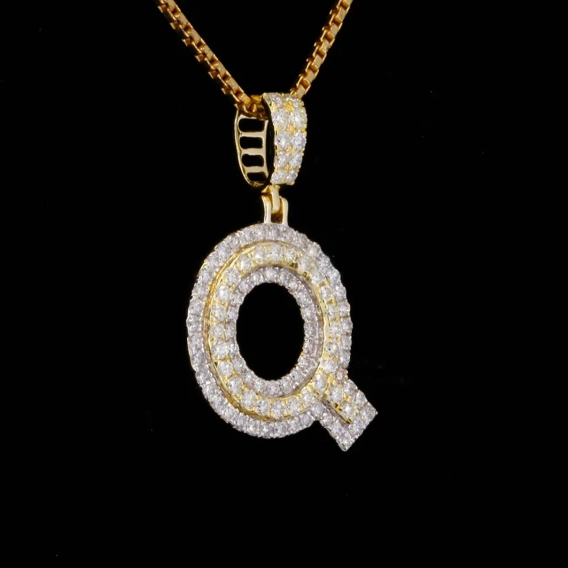 Iced out bubble letter Q pendant necklace with micro pavé diamonds in yellow gold