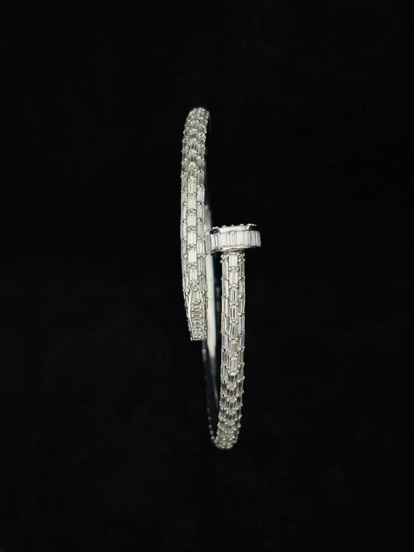 Silver diamond nail bracelet with baguette-set stones