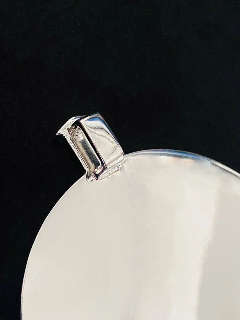 Iced out moissanite diamond compass pendant in sterling silver