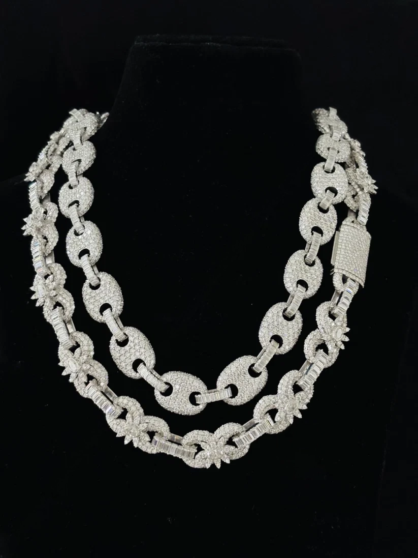Luxury diamond interlocking chain link necklace featuring pave starburst floral accents 