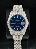 front view Fully iced-out Rolex Datejust watch with diamond case and blue dial