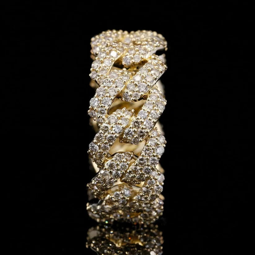 Close-up of a luxury 14k gold diamond-encrusted Cuban link chain ring.