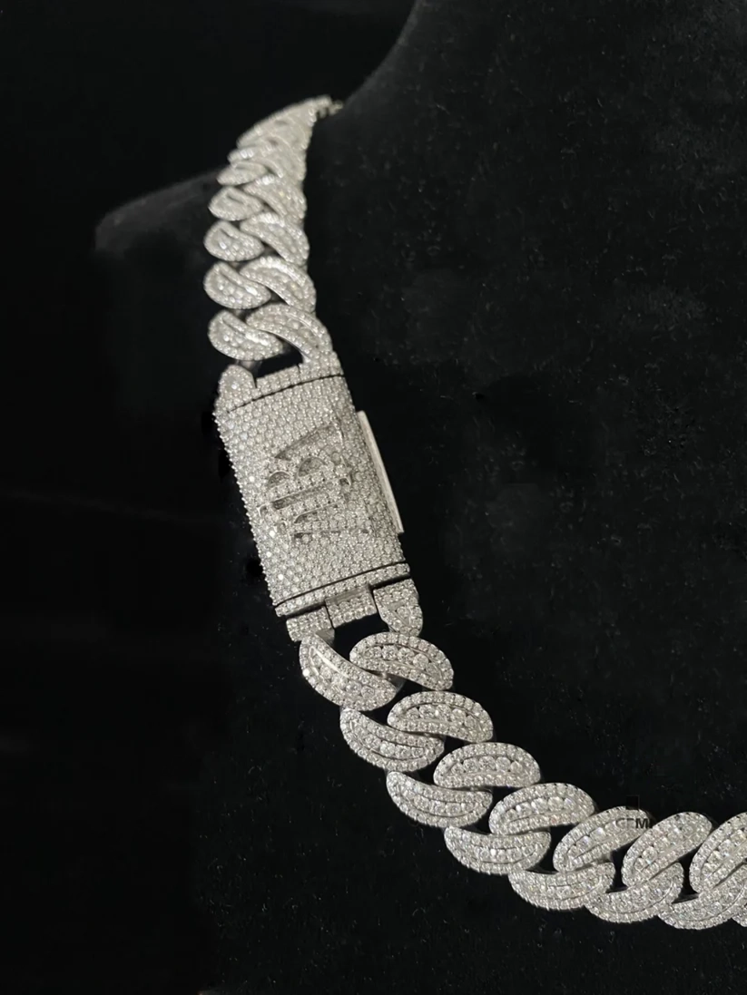 Diamond Cuban link chain necklace with custom iced-out diamond clasp closure close-up