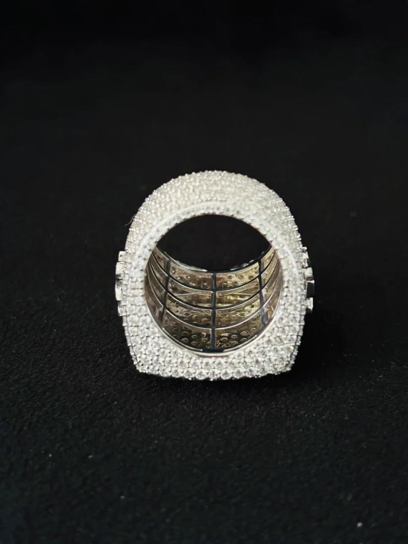 A back view Chunky heavy silver iced-out pave set diamond ring for men