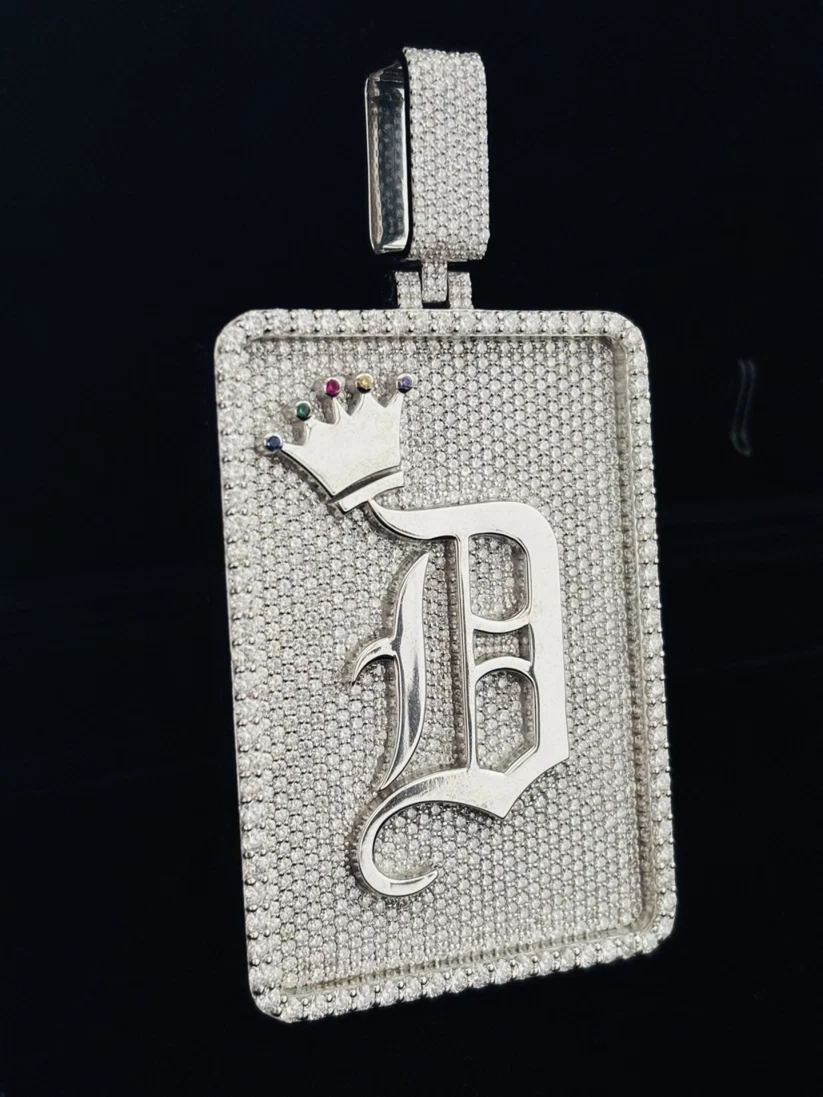 Custom diamond hip hop pendant with an Old English letter D and a crown accent in white gold.