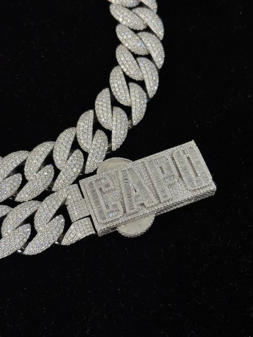 White gold iced out Cuban link chain with custom CAPO baguette diamond clasp
