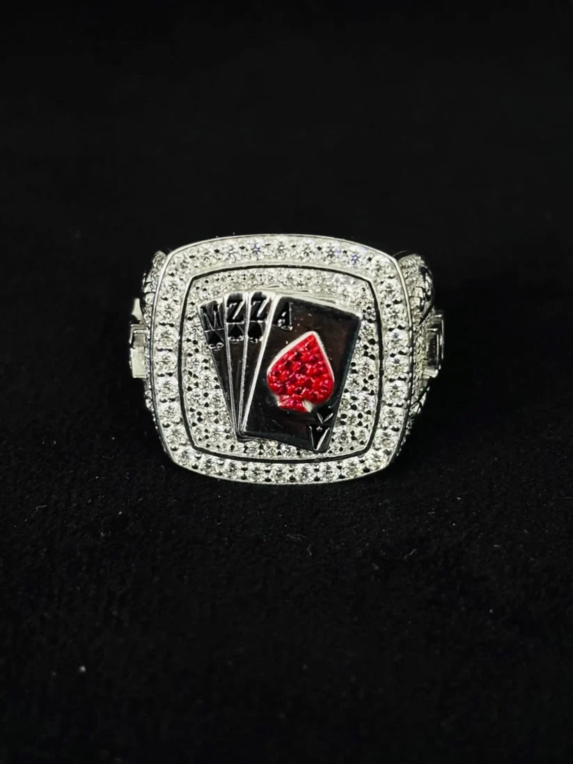 Men's iced out hip hop ring featuring four playing cards with a red rhinestone ace of spades
