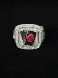 Men's iced out hip hop ring featuring four playing cards with a red rhinestone ace of spades