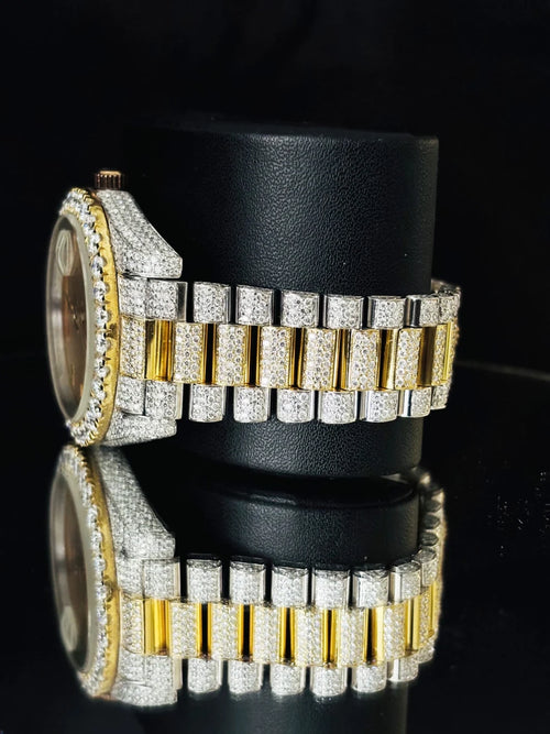 Luxury diamond-paved custom watch side profile on a black display stand
