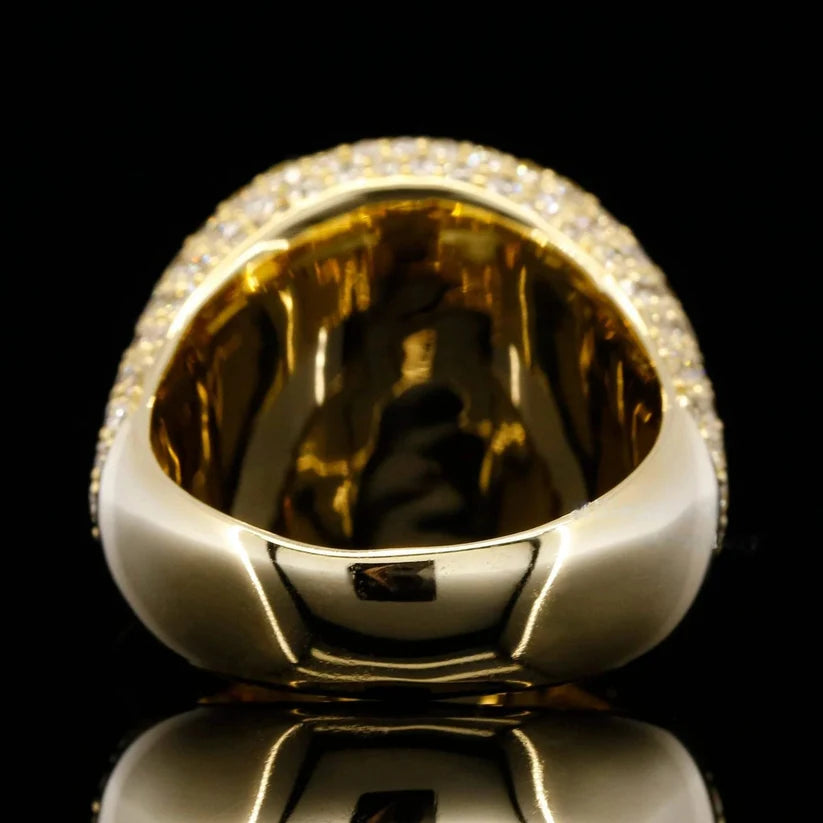Close up view of the back and interior of a thick yellow silver pave diamond ring