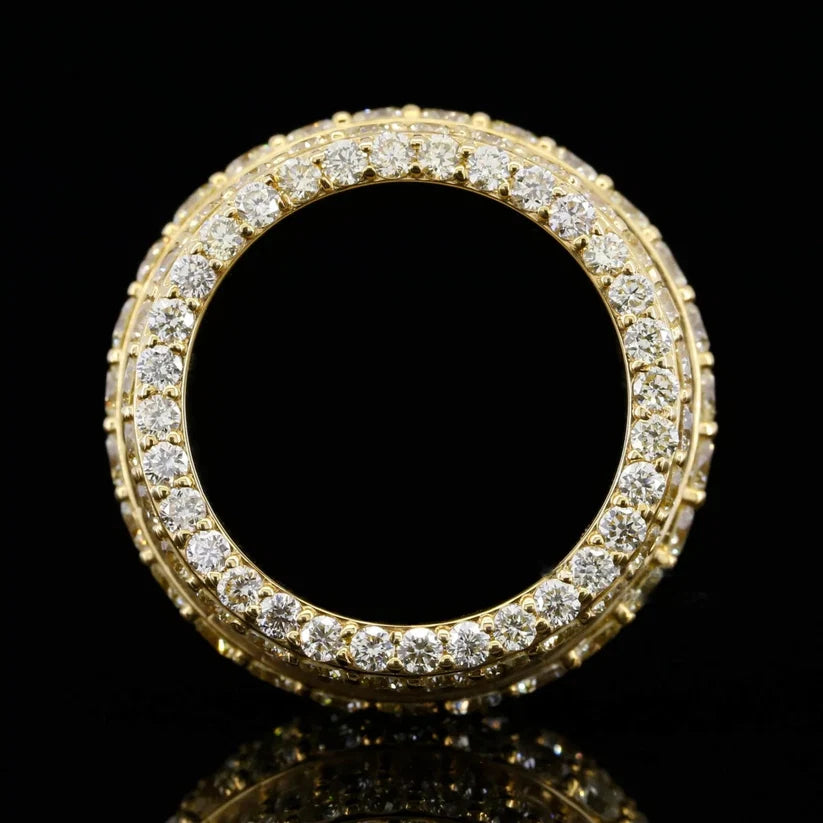 Top view of a luxury yellow gold eternity band ring encrusted with round brilliant-cut diamonds