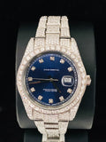 Iced out men's Rolex style watch with pavé diamonds and blue dial