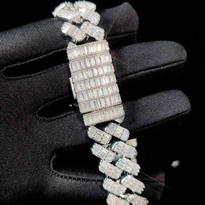 Men's luxury white gold Cuban link bracelet featuring baguette diamonds and custom box clasp