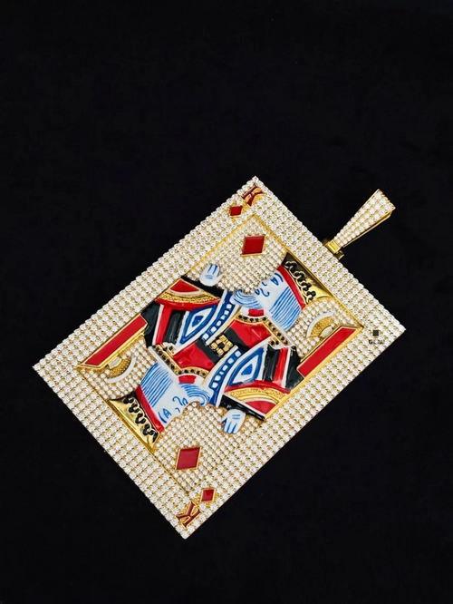 Iced out King of Diamonds playing card pendant necklace in yellow gold with colorful enamel details.
