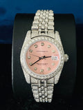 front view Luxury diamond-encrusted Rolex Oyster Perpetual Datejust watch with a pink dial and Jubilee watch band
