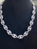 front view of the Silver iced out mariner puff link chain necklace