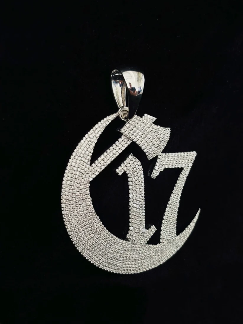 925 sterling silver iced out Chapter 17 crescent moon and axe pendant studded with moissanite stones