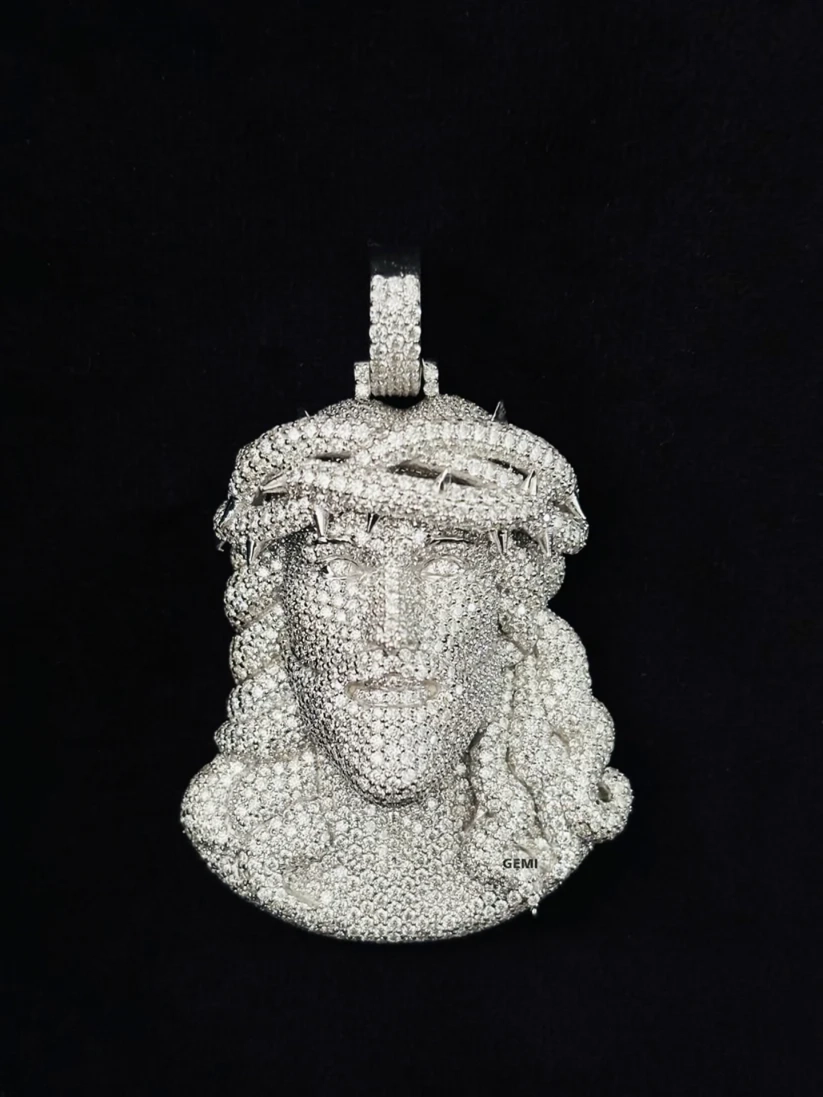 Diamond-encrusted silver Jesus piece pendant with a crown of thorns